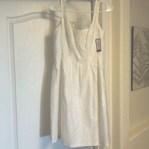 Nine West size 4 Petal white dress with pockets.